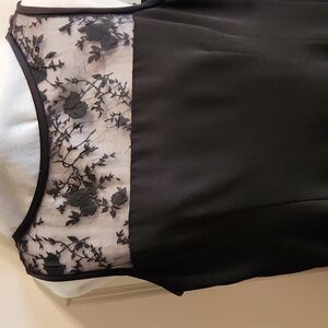 Donna Ricco. Elegant little black dress  with beautiful lace yoked top. Size 12p